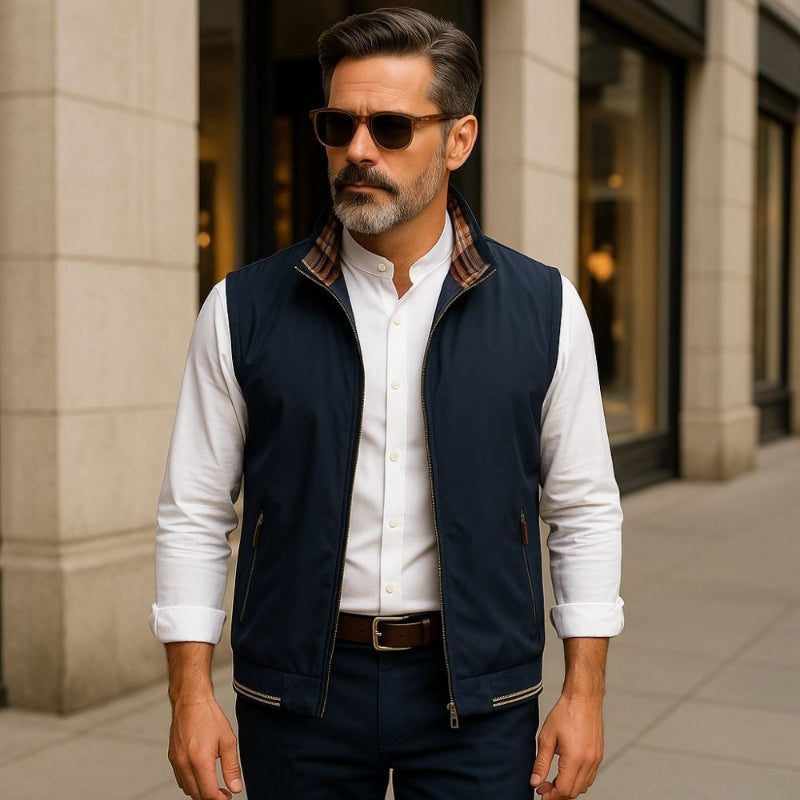 Man wearing Luigi Heritage Plaid Vest in Navy with white shirt and plaid-lined collar in an urban setting
