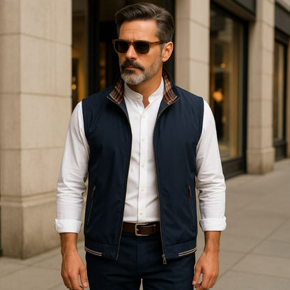 Man wearing Luigi Heritage Plaid Vest in Navy with white shirt and plaid-lined collar in an urban setting