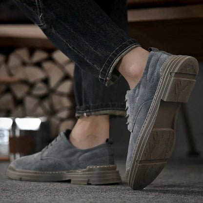 Mario Genuine Suede Shoes – avio gray men’s loafers worn on foot, side view; soft suede and flexible outsole for daily wear.