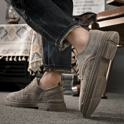 Mario Genuine Suede Shoes – gray men’s loafers worn on foot, side view; breathable suede and shock-absorbing sole.