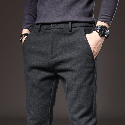 Detail shot of dark gray Massimo Modern Slim Pants showing high-quality stitching and texture.