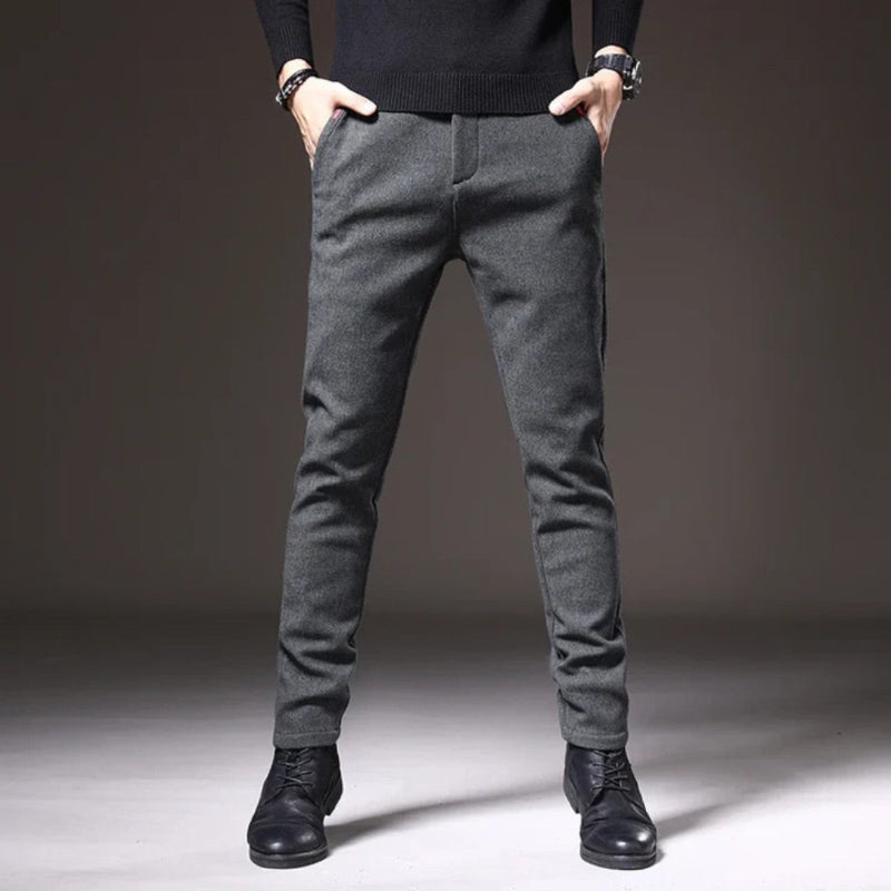 Elegant front view of gray Massimo Modern Slim Pants for men, slim fit wool-blend trousers styled with black sweater.