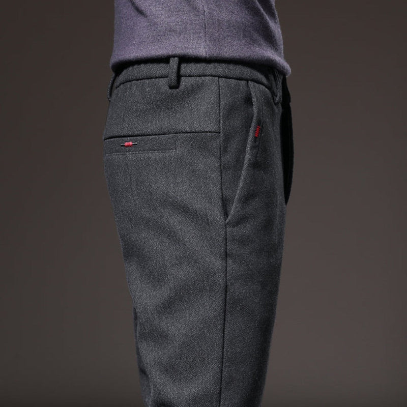 Side profile of gray Massimo Modern Slim Pants, showcasing sleek tailoring and premium fabric.