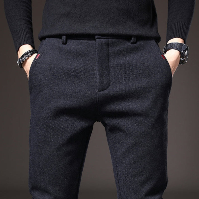 Close-up of navy Massimo Modern Slim Pants highlighting tailored waistband and side pockets.