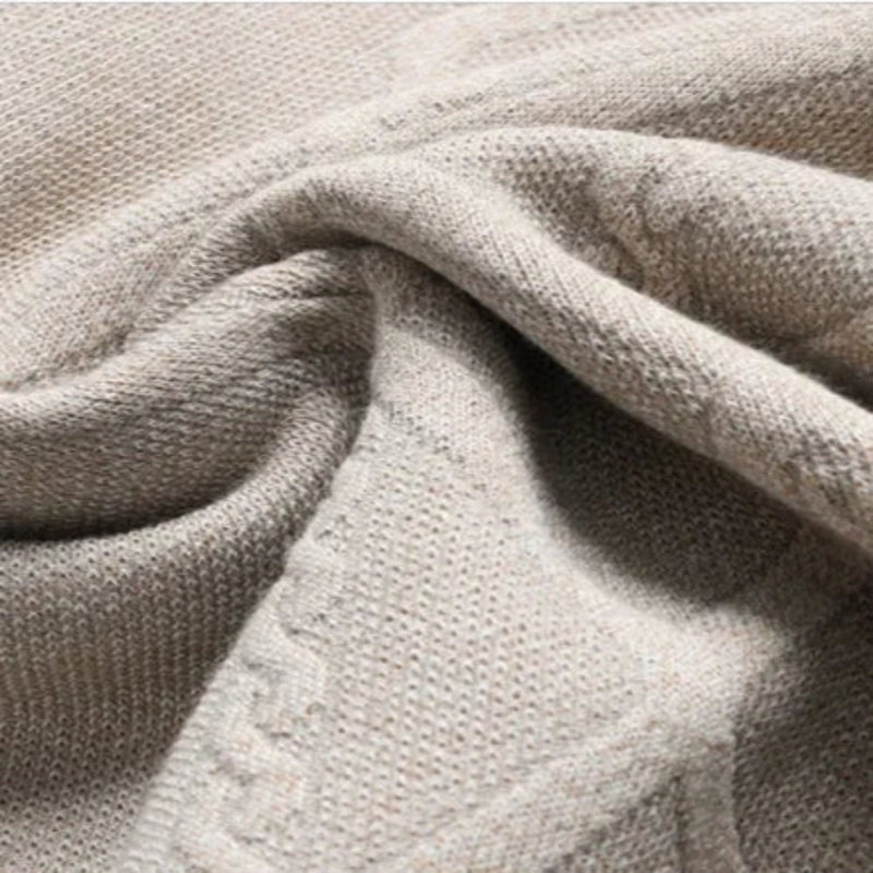Close-up of Mauro Crewneck Knit Sweater fabric showing fine knit texture and soft wool blend quality.