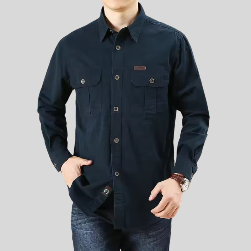 Male model wearing men’s navy blue cotton shirt – long sleeve slim fit.