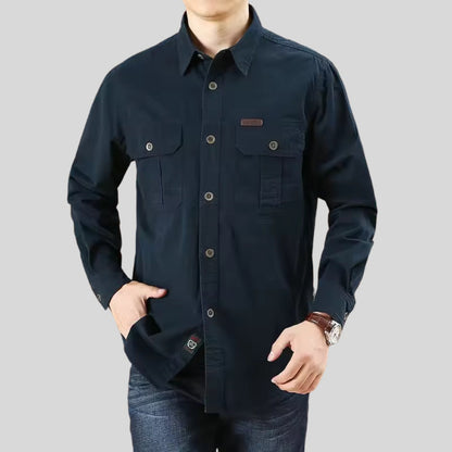 Male model wearing men’s navy blue cotton shirt – long sleeve slim fit.