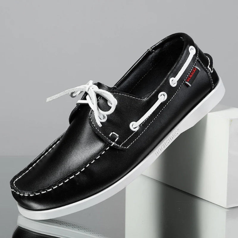 Men’s leather boat shoes in black with white sole and nautical laces, classic casual moccasins for smart summer outfits