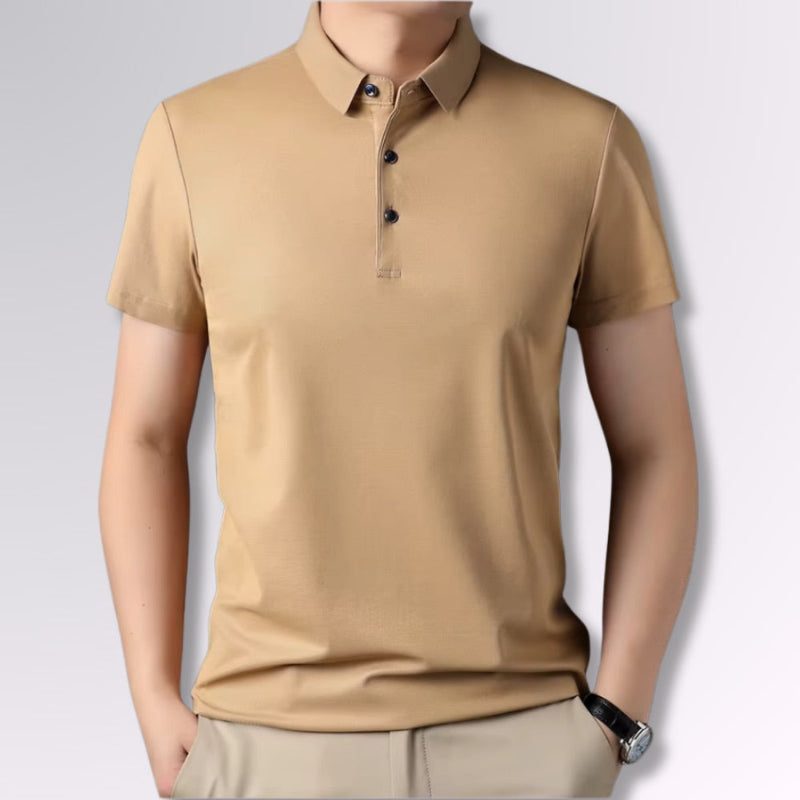 Men’s beige polo shirt short sleeves, slim fit with button placket, styled with casual pants.