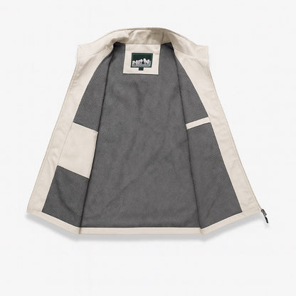 Men’s utility vest in ivory, inside view with breathable mesh lining and inner storage pockets.