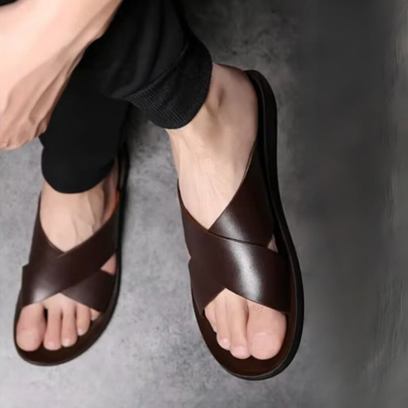 Brown Milano men’s leather sandal worn on foot, casual look.