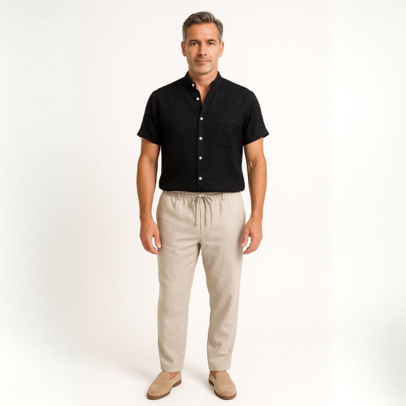 Man wearing Milano men’s shirt and pants set in black linen front view