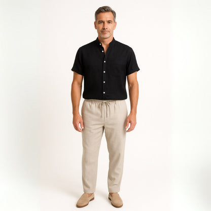 Man wearing Milano men’s shirt and pants set in black linen front view