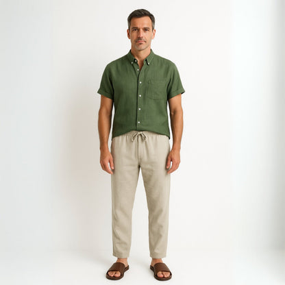 Man wearing Milano men’s shirt and pants set in green linen front view