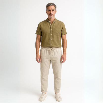 Man wearing Milano men’s shirt and pants set in mustard linen front view