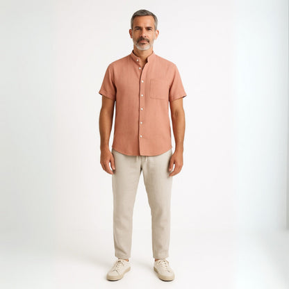 Man wearing Milano men’s shirt and pants set in salmon linen front view