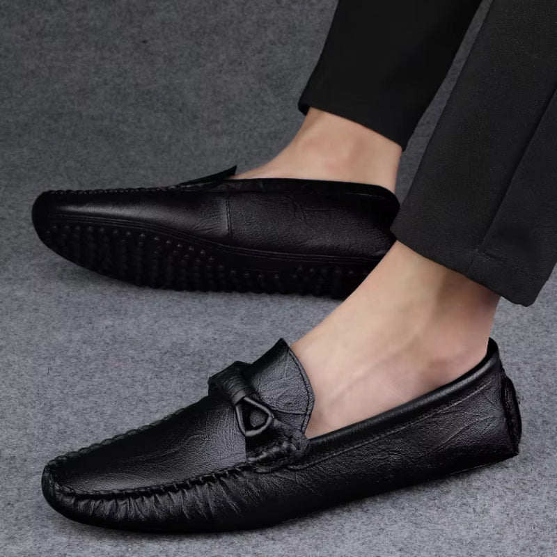 Niccolò Genuine Leather Moccasin in hammered black – men's leather driving loafer shown on feet, highlighting textured sole and modern fit by Polumi.