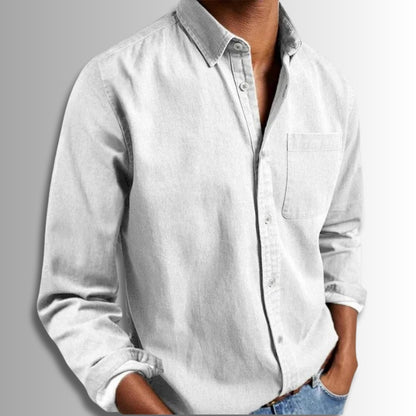 White button-up shirt worn by a person on a gray background