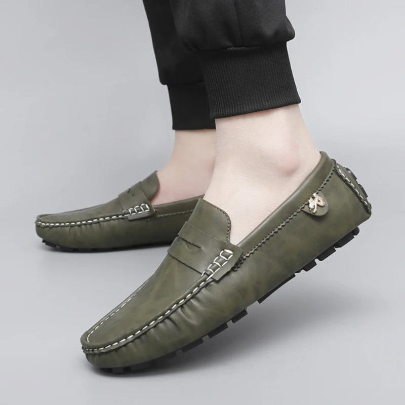 Polumi Carlo Alberto Leather Loafers in green – men’s leather driving loafers showcased on feet with casual Italian elegance.