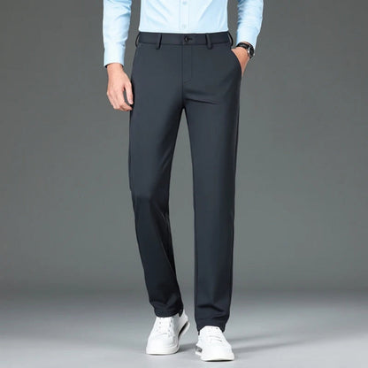 Polumi Fabio Luxe Office Slacks in dark gray — modern fit men’s trousers combining stretch comfort and professional elegance.