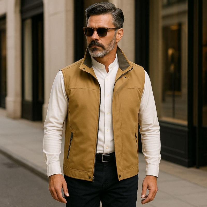Man wearing Sergio DoubleSided Adapt Vest in Beige and Green paired with a white shirt outdoors
