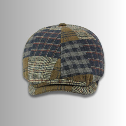 Sicilia Patchwork Tweed Cap in navy – front view of men's patchwork tweed cap with vintage plaid panels and soft curved brim by Polumi.
