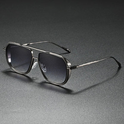 Classic aviator sunglasses with black metal frame and gray gradient lenses, stylish men’s accessory.