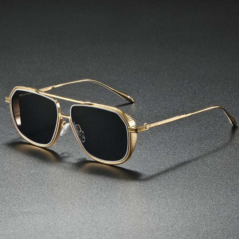 Luxury aviator sunglasses with golden metal frame and black lenses, modern men’s fashion accessory.