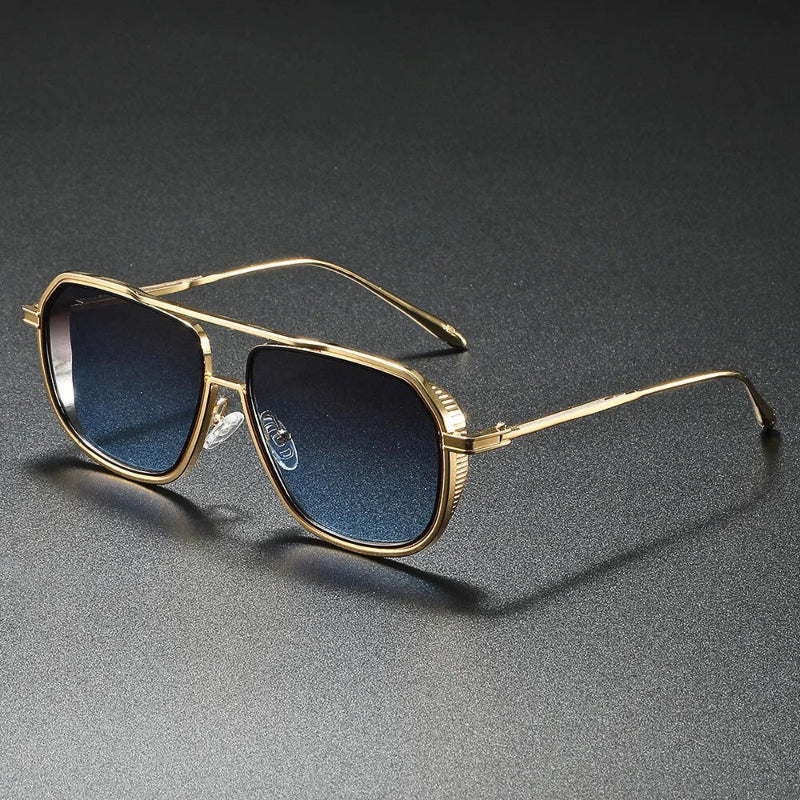 Golden aviator sunglasses with blue gradient lenses, luxury unisex fashion eyewear.