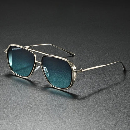 Modern aviator sunglasses with silver frame and blue gradient lenses, premium unisex eyewear.
