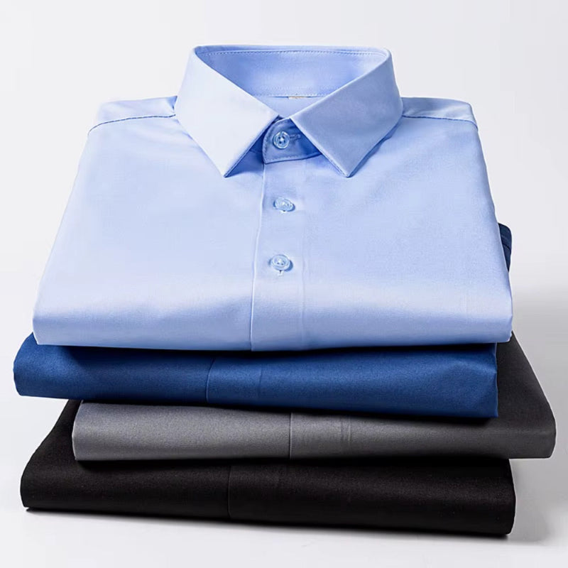 Stack of Torino Flex-Fit Men's Shirts in sky blue, navy, gray, and black – premium stretch fabric and Italian fit.