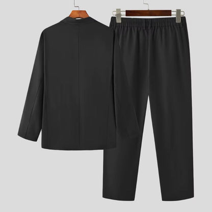 Back view of Torino Men’s Soft Suit in black, showing modern loose fit and elegant tailoring.
