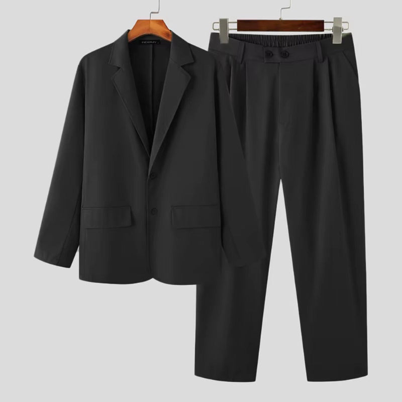 Torino Men’s Soft Suit in black color, front view of relaxed Italian-style jacket and pants set for men.
