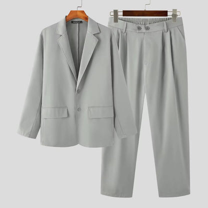 Torino Men’s Soft Suit in light gray, front view of minimal blazer and trousers for men.
