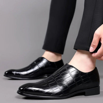 Valerio Leather Loafers in black, men’s dress shoes worn with black trousers, formal outfit style.