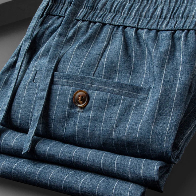 Back pocket detail with button on blue Valerio Poldini relaxed men's pants
