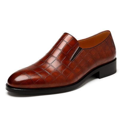 Leather Loafers in brown, elegant men’s slip-on shoes in crocodile textured leather.
